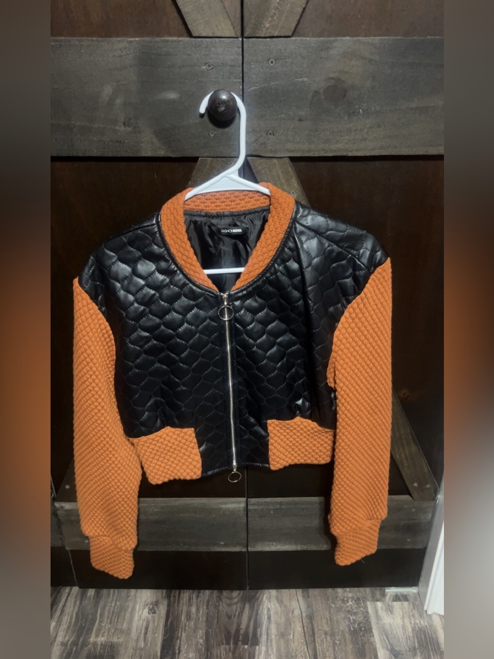 Fashion Nova Black Quilted Bomber Jacket with Orange Knit Sleeves